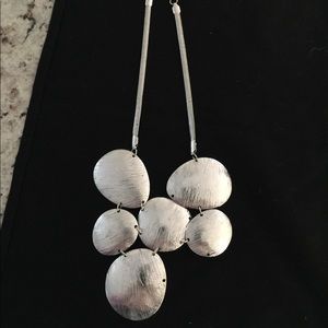 Silver necklace.